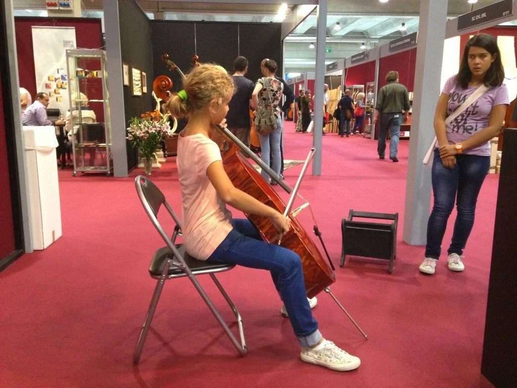 A young musician plays a Gregorio Martini cello on the stand
